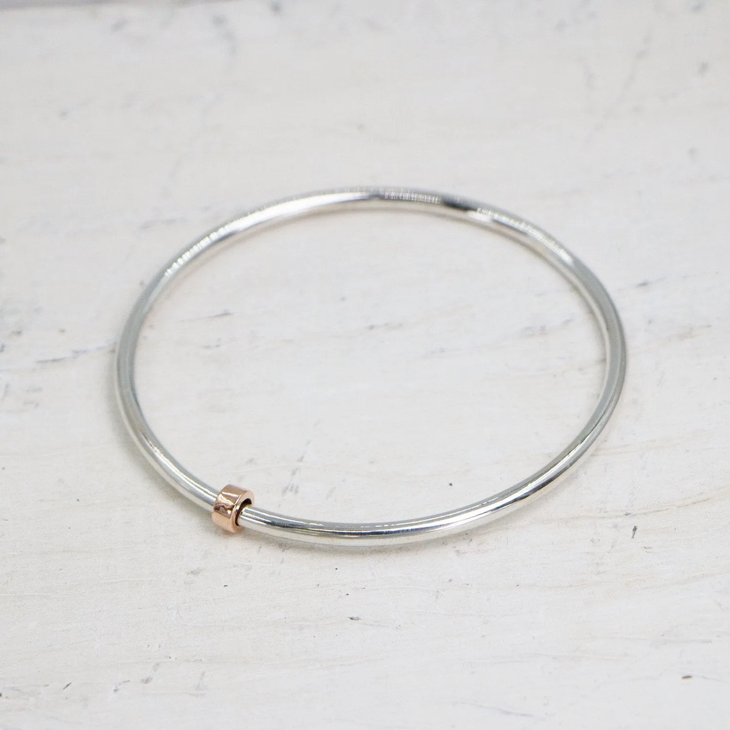 925 Silver bangle with little copper spinner - Size W6.5