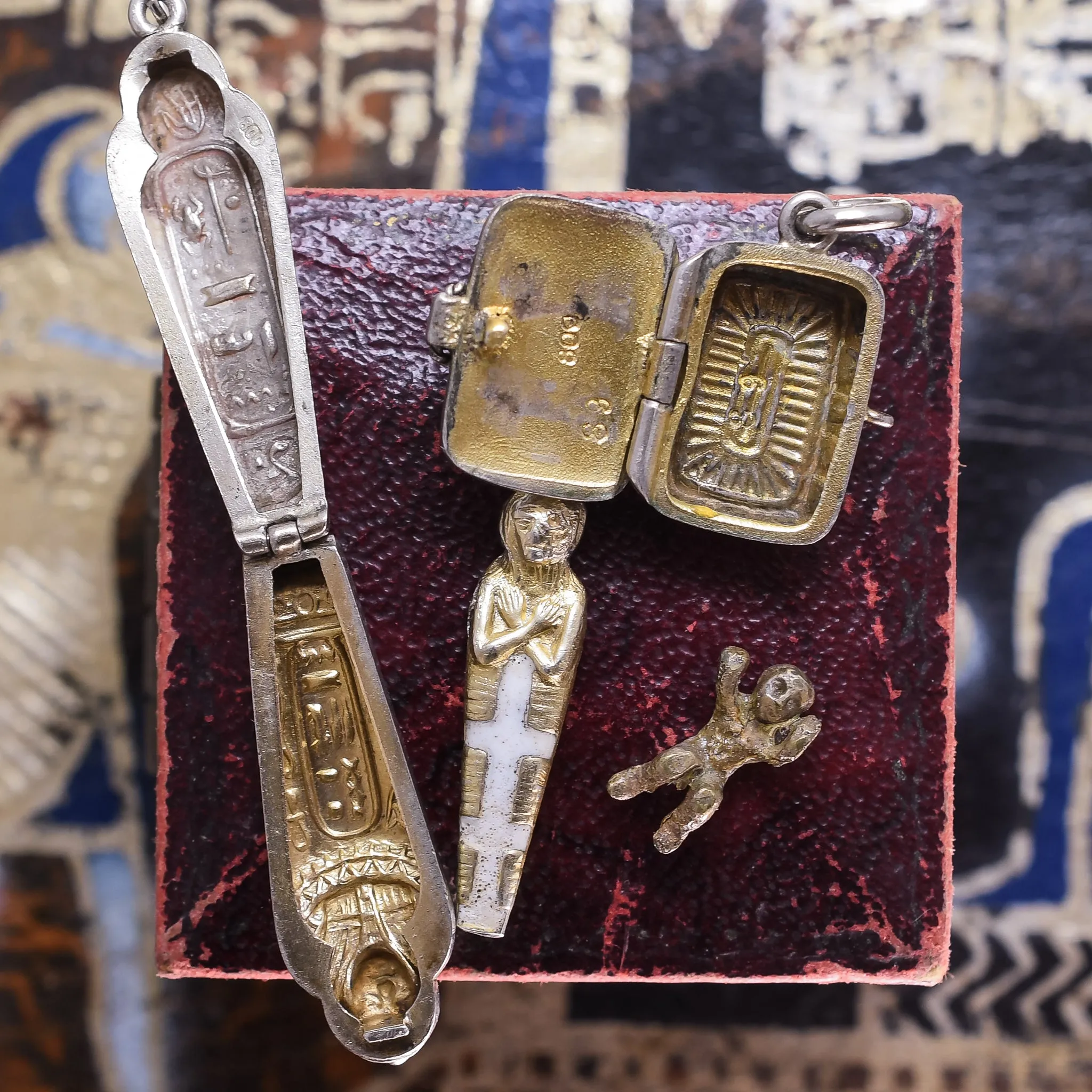 Egyptian Revival Enamel Moses & Sarcophagus Pendants