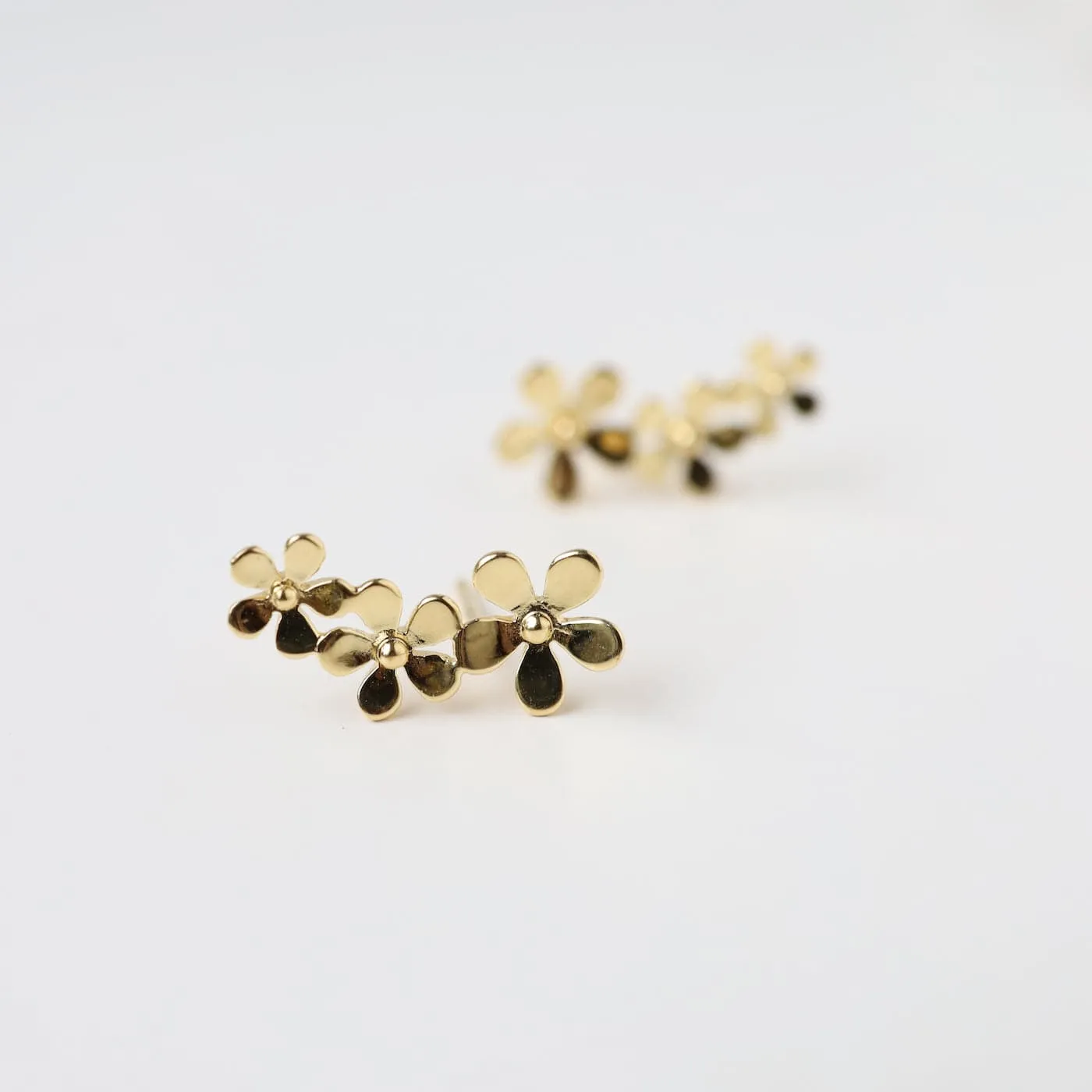 Gold Vermeil Climbing Curve of Forget Me Not Flowers Stud Earrings