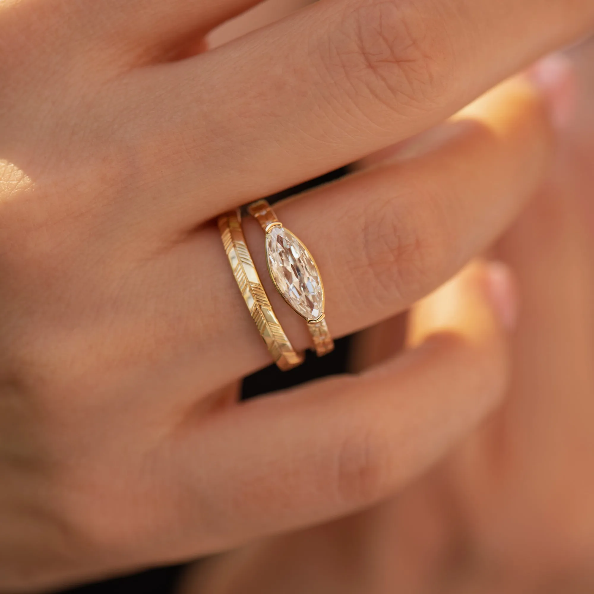 Golden Wedding Band with an Abstract Feather Engraving