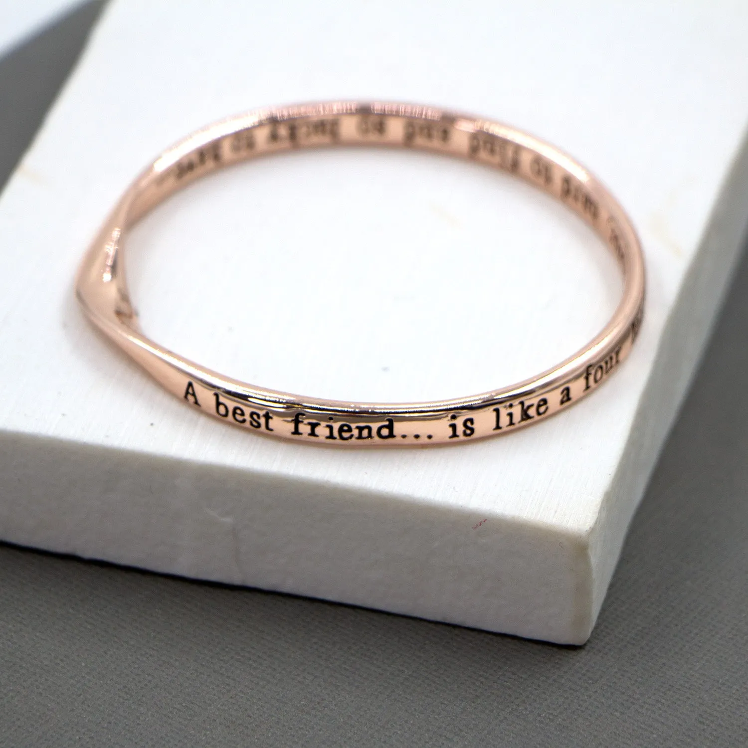 "A best friend is like a four leaf clover" bangle