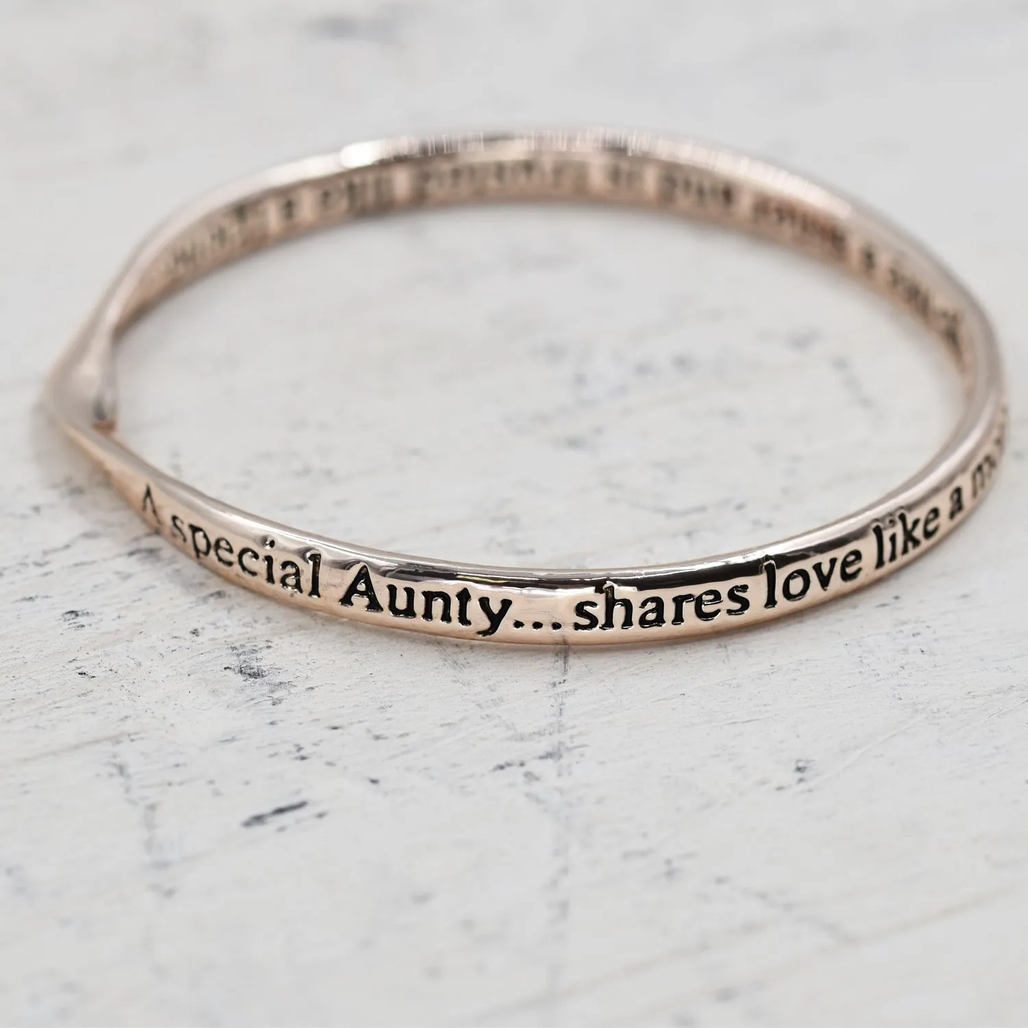 "A special aunty shares love like a mother" bangle
