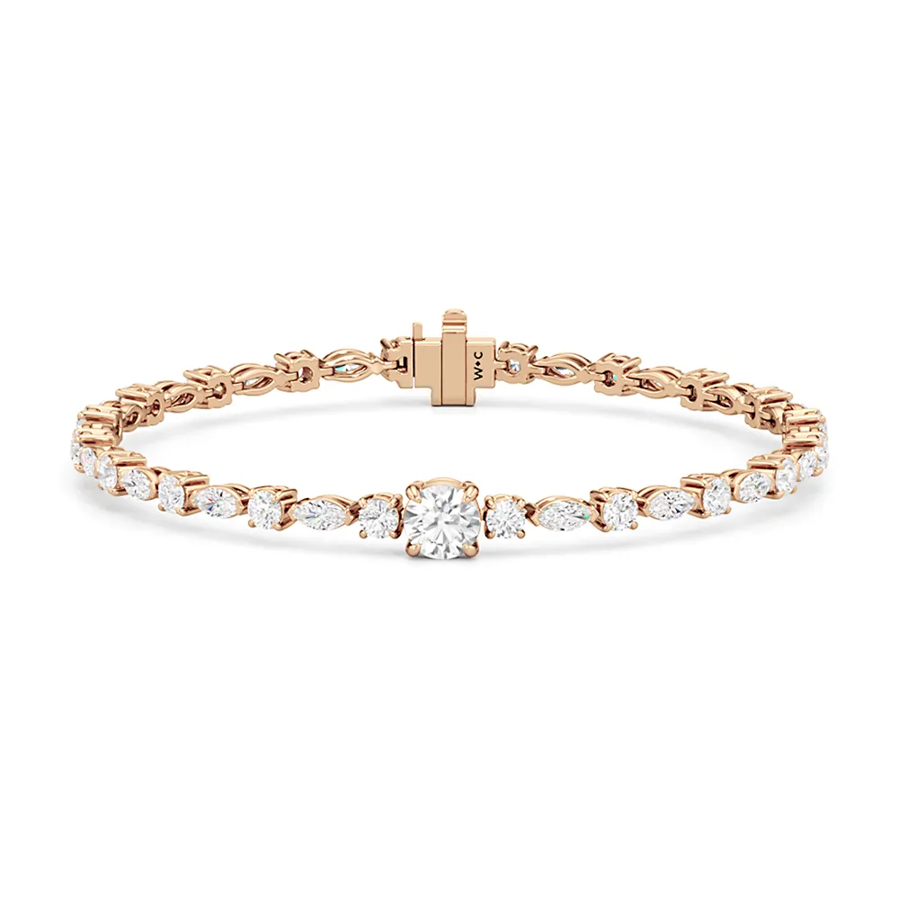 Round with Trailing Round and Marquise Tennis Bracelet