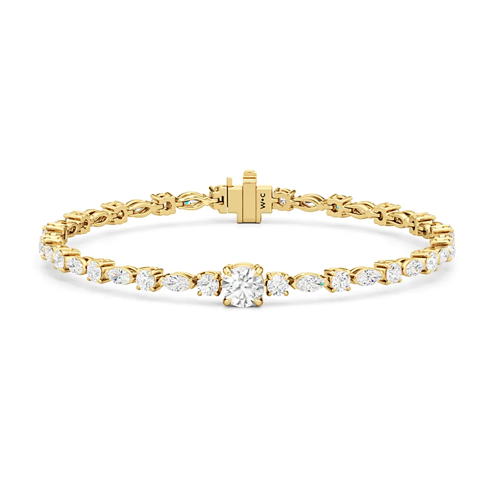 Round with Trailing Round and Marquise Tennis Bracelet