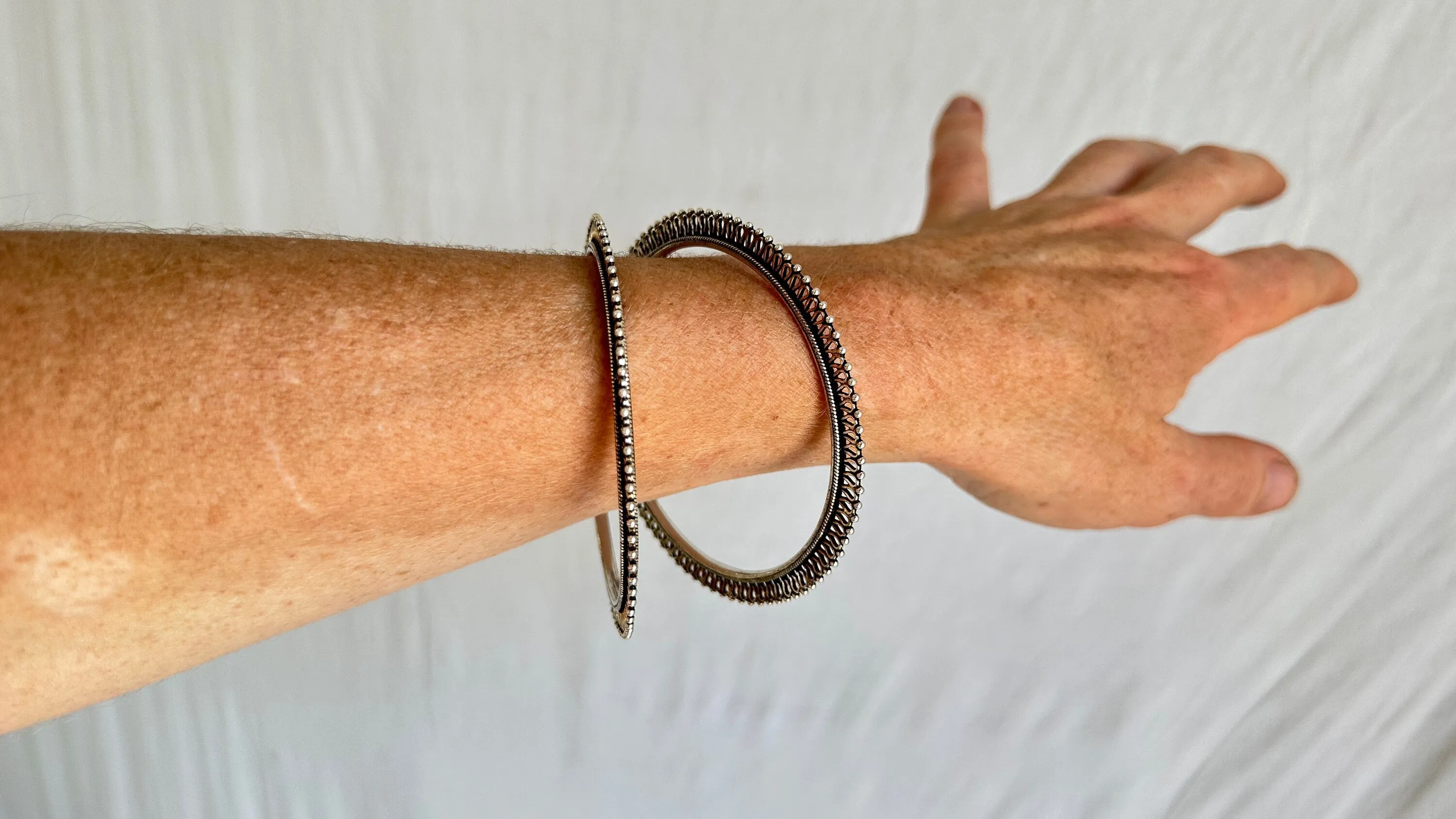 Two Sterling Silver Bangles. India. 1050