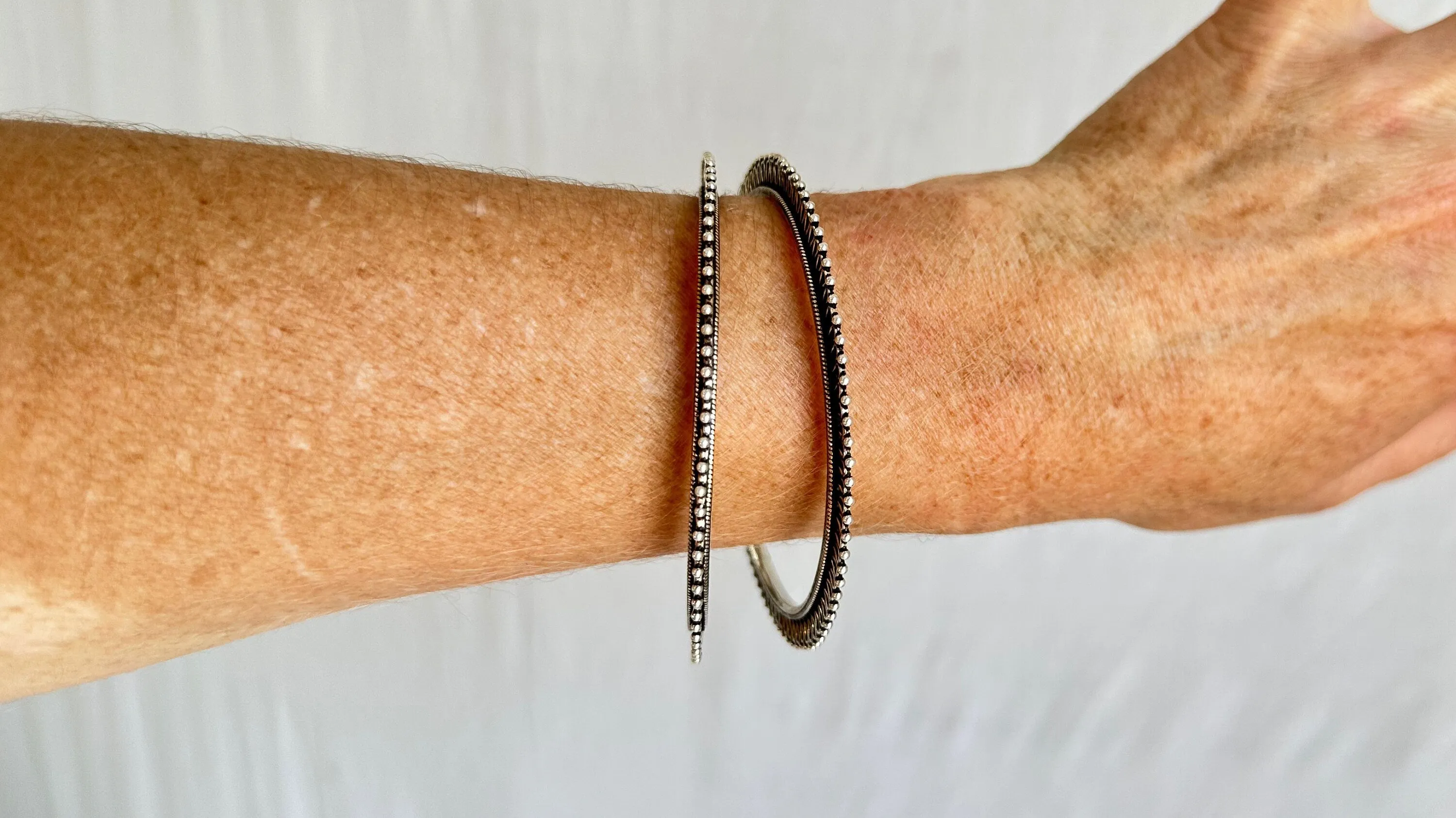 Two Sterling Silver Bangles. India. 1050