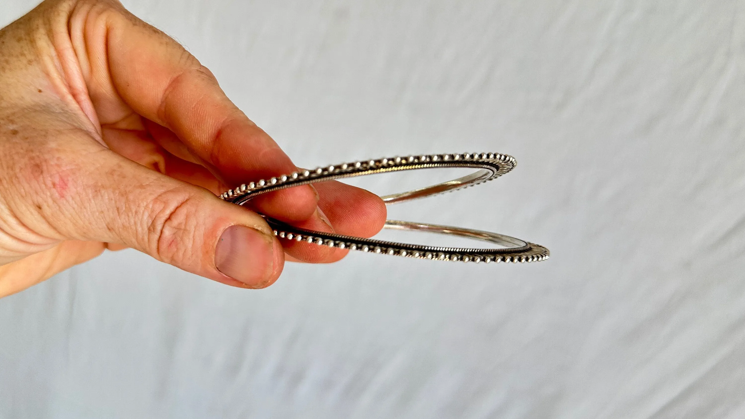 Two Sterling Silver Bangles. India. 1050
